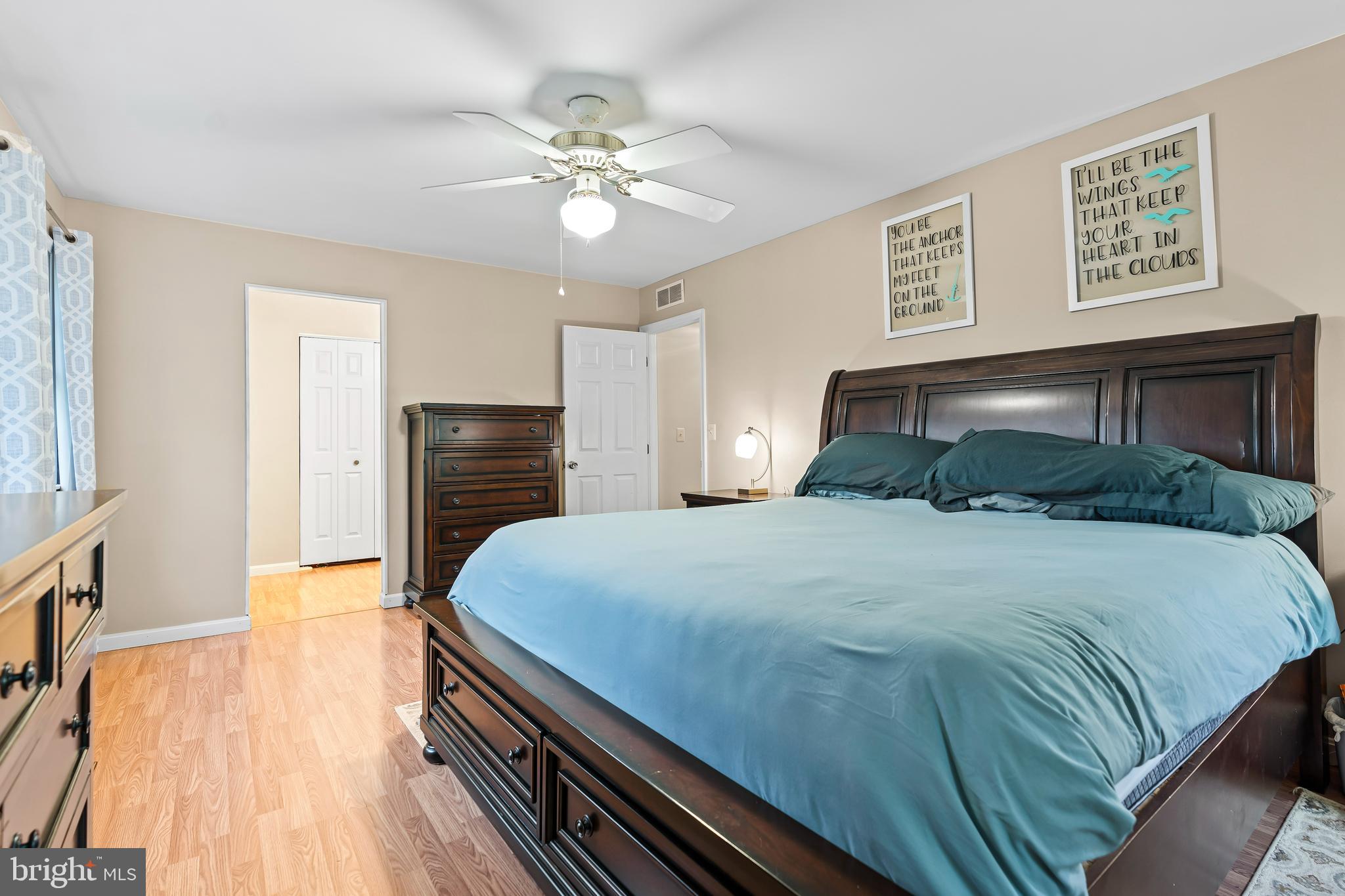 18347 Manor Church Road Boonsboro, MD 21713 - Photo 32 of 70 a bedroom with a bed and wooden floor