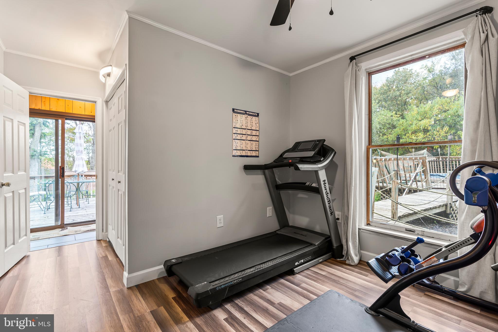 18347 Manor Church Road Boonsboro, MD 21713 - Photo 53 of 70 a room with gym equipment and a large window