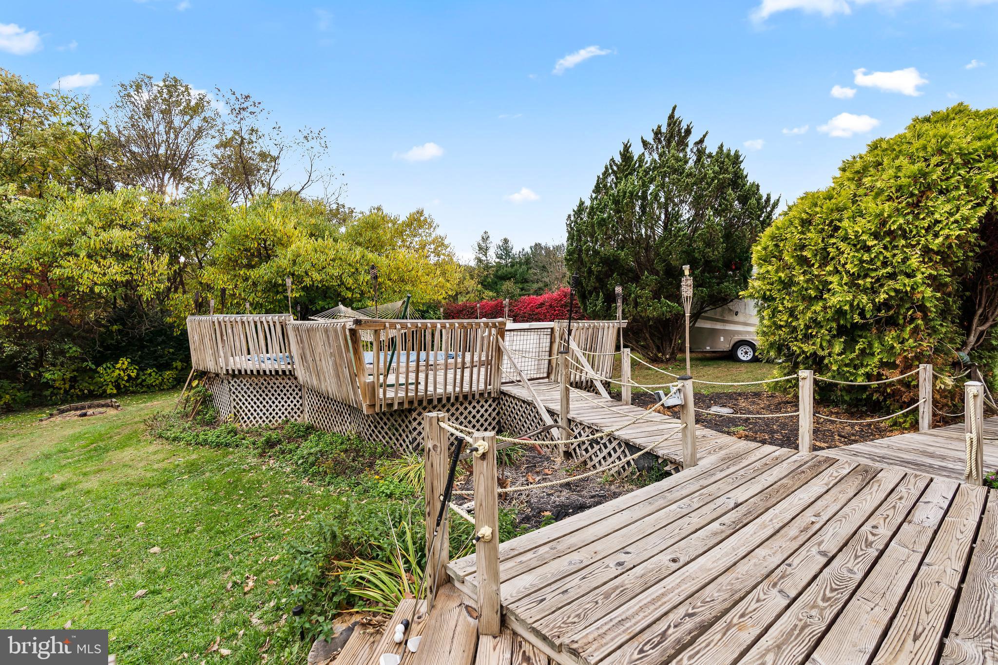 18347 Manor Church Road Boonsboro, MD 21713 - Photo 57 of 70 a view of a roof deck with couches and wooden floor