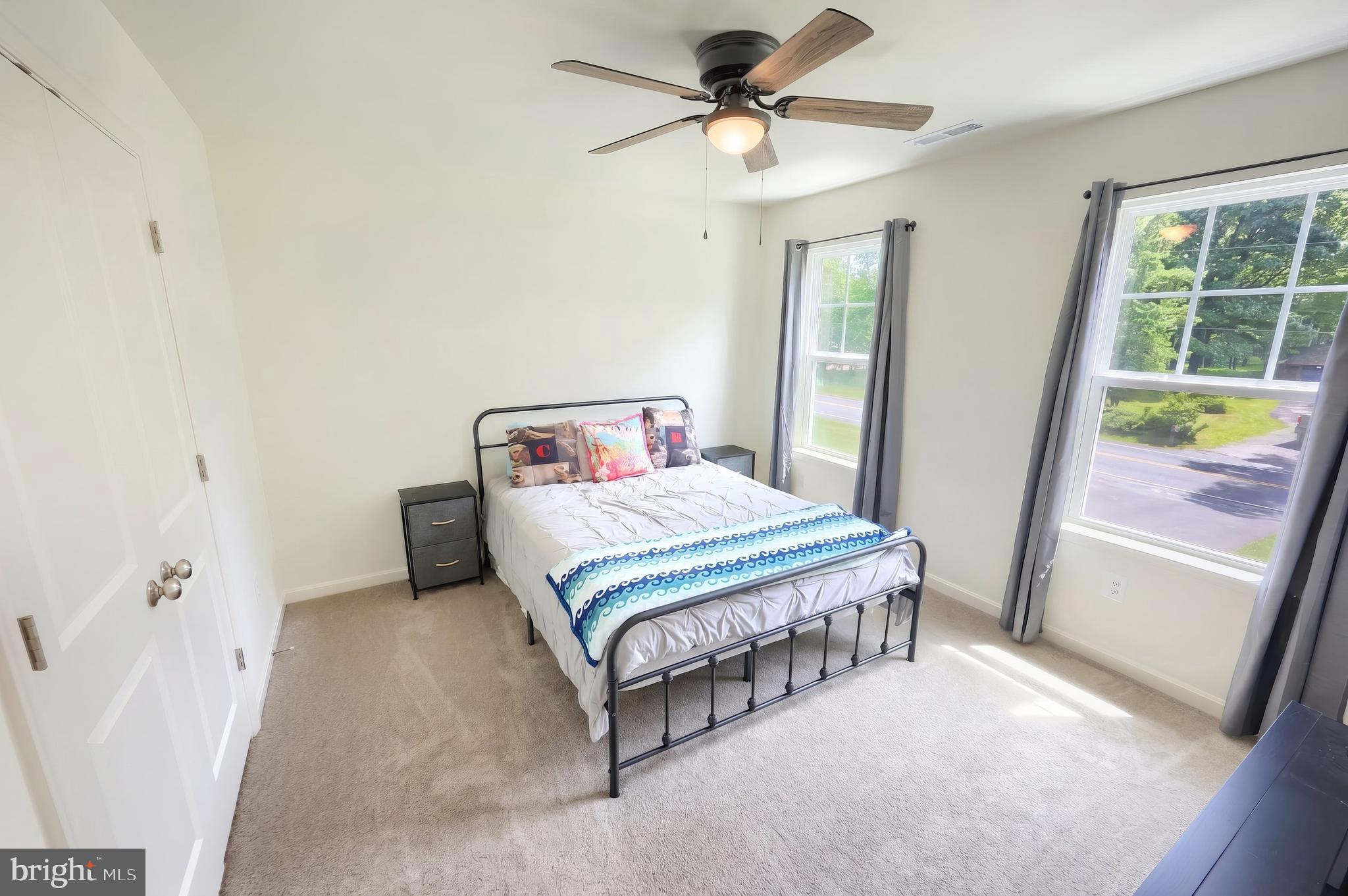 2741 Cold Springs Road Orrtanna, PA 17353 - Photo 28 of 52 a bedroom with a bed a window and a chandelier
