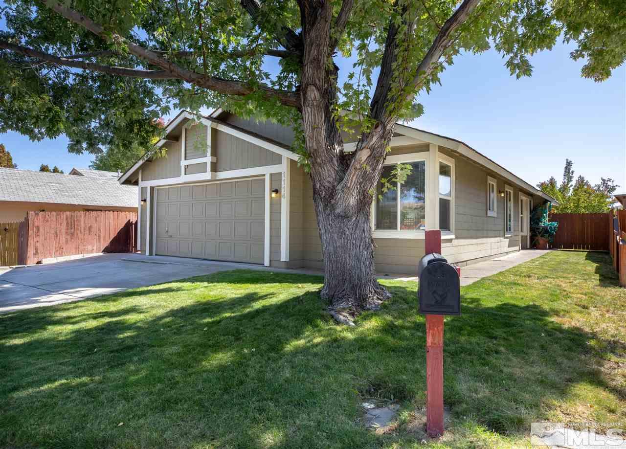 1114 Indian Cove Way Reno, NV 89523 - Photo 1 of 17 a front view of house with yard and green space