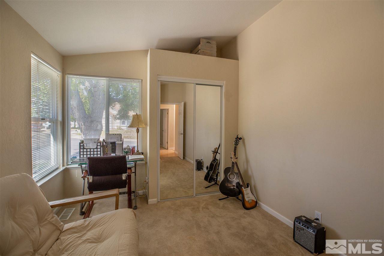 1114 Indian Cove Way Reno, NV 89523 - Photo 14 of 17 a view of a livingroom with furniture and windows