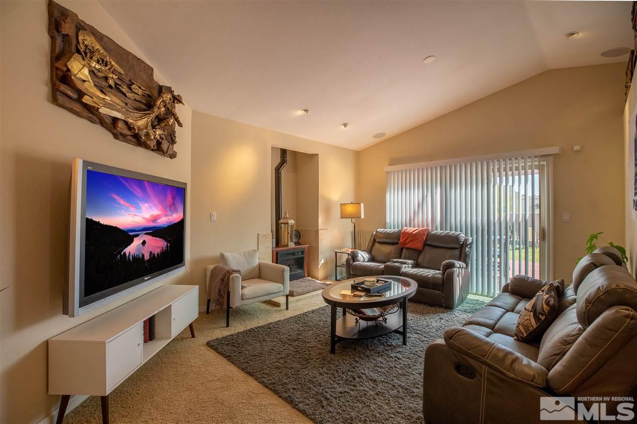 1114 Indian Cove Way Reno, NV 89523 - Photo 5 of 17 a living room with furniture and a flat screen tv
