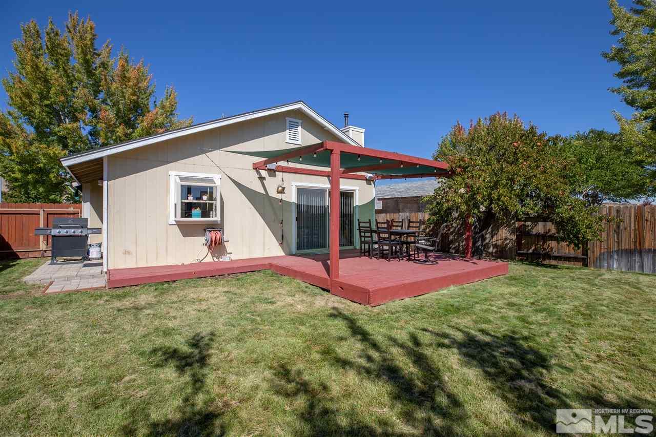 1114 Indian Cove Way Reno, NV 89523 - Photo 10 of 17 a view of a house with backyard and sitting area
