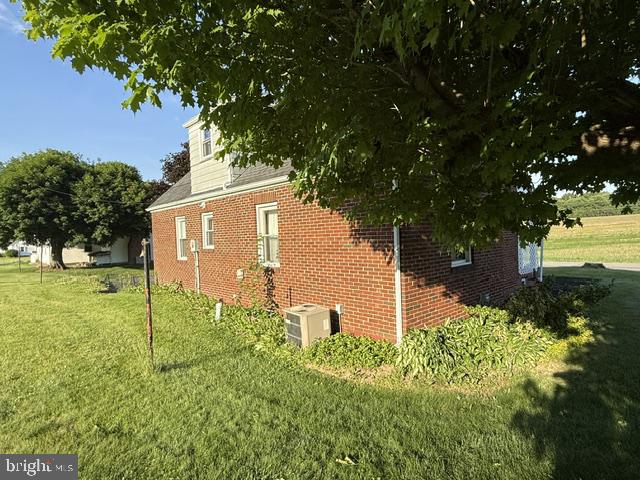 19642 Raystown Road James Creek, PA 16657 - Photo 7 of 42 Charming brick home under a leafy canopy.