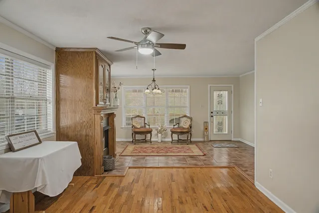 a view of a livingroom with furniture and wooden floor