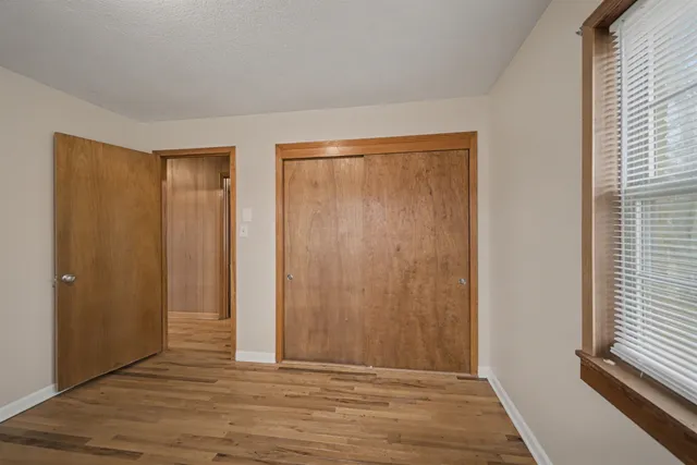 a view of a livingroom with wooden floor