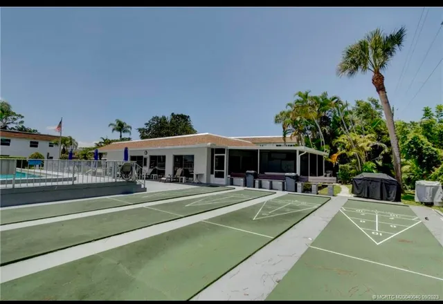 a view of a house with a swimming pool