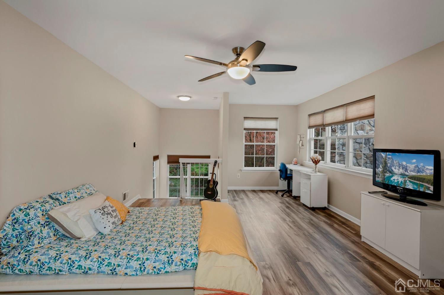 58 Nova Drive Piscataway, NJ 08854 - Photo 13 of 16 a living room with furniture and a flat screen tv