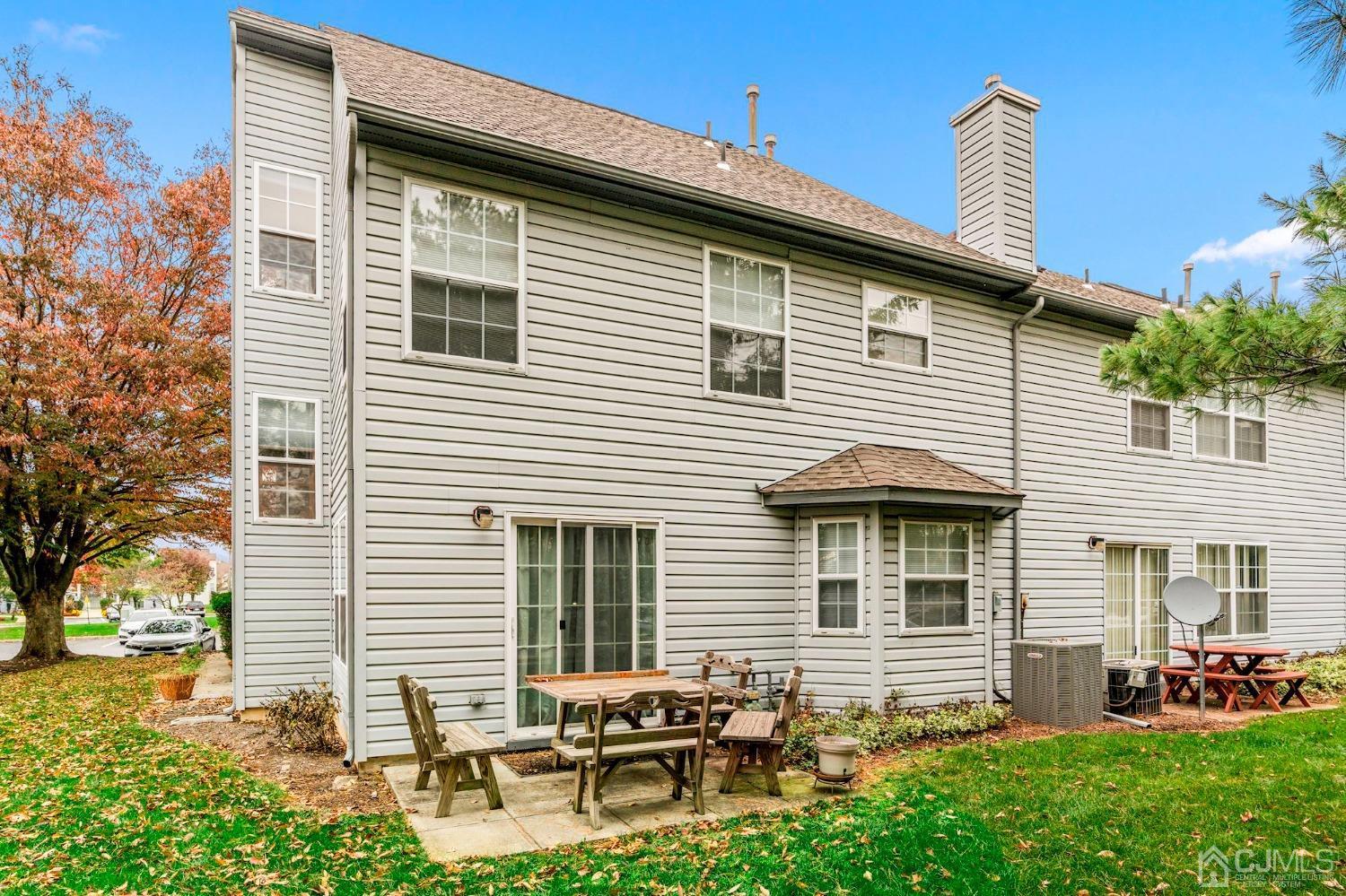58 Nova Drive Piscataway, NJ 08854 - Photo 2 of 16 a backyard of a house with outdoor seating