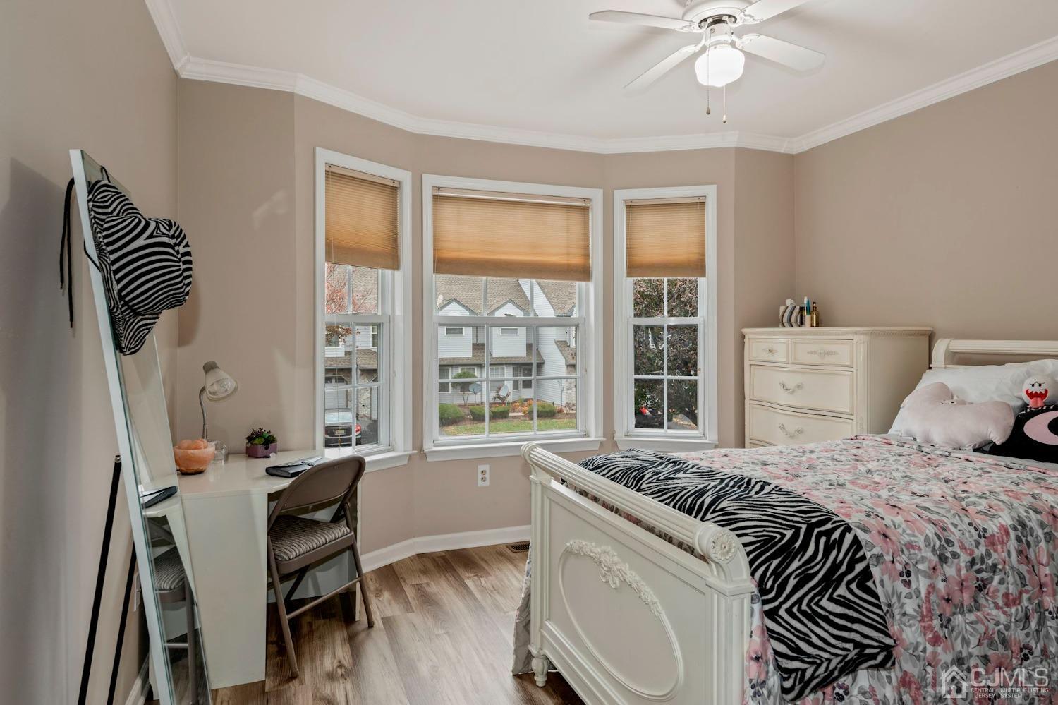 58 Nova Drive Piscataway, NJ 08854 - Photo 10 of 16 a bedroom with a bed and a window