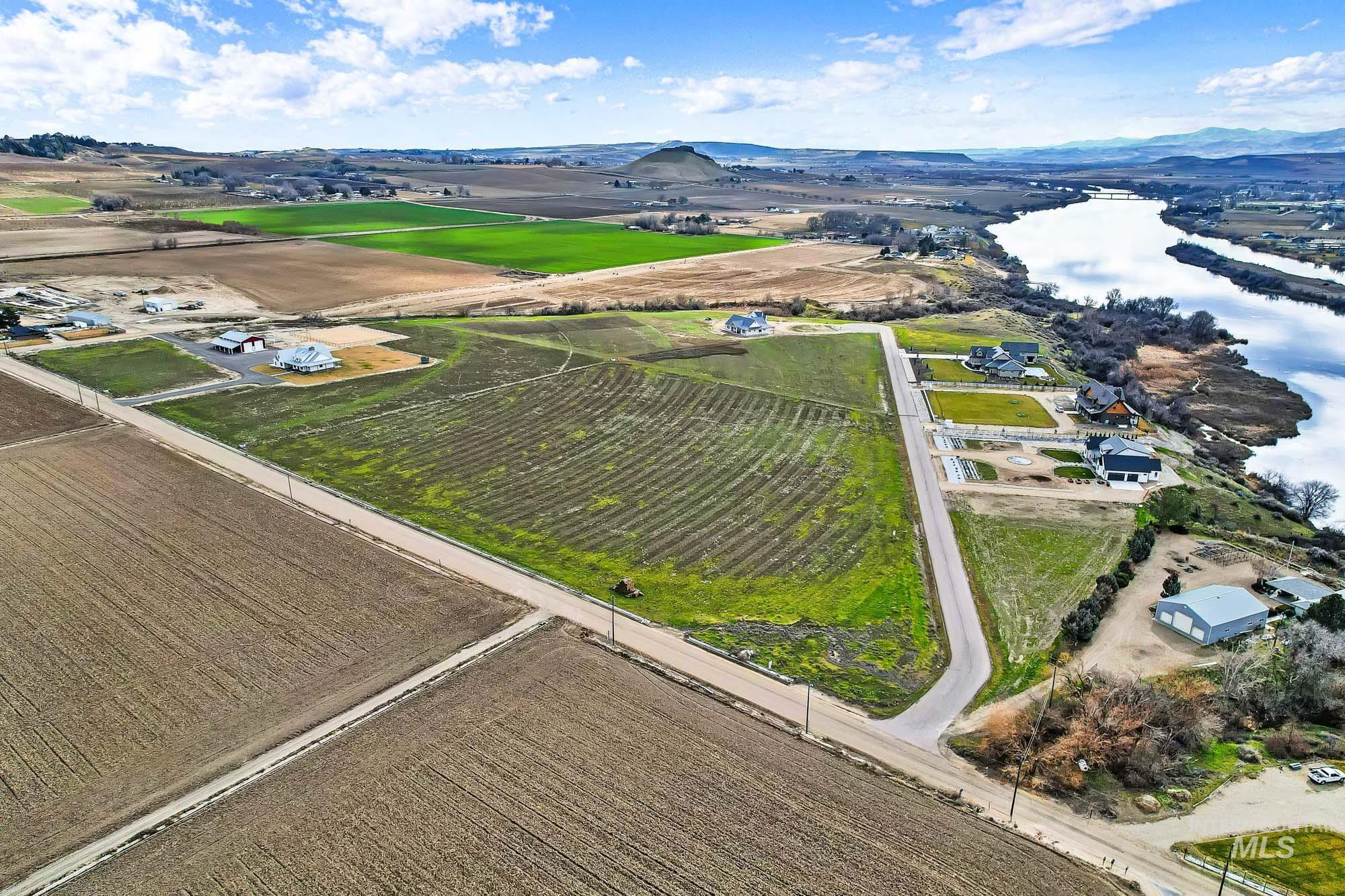 Tbd Tbd Cabernet Lane Caldwell, ID 83607 - Photo 5 of 15 View of rural area featuring extensive farmland and a mountain backdrop