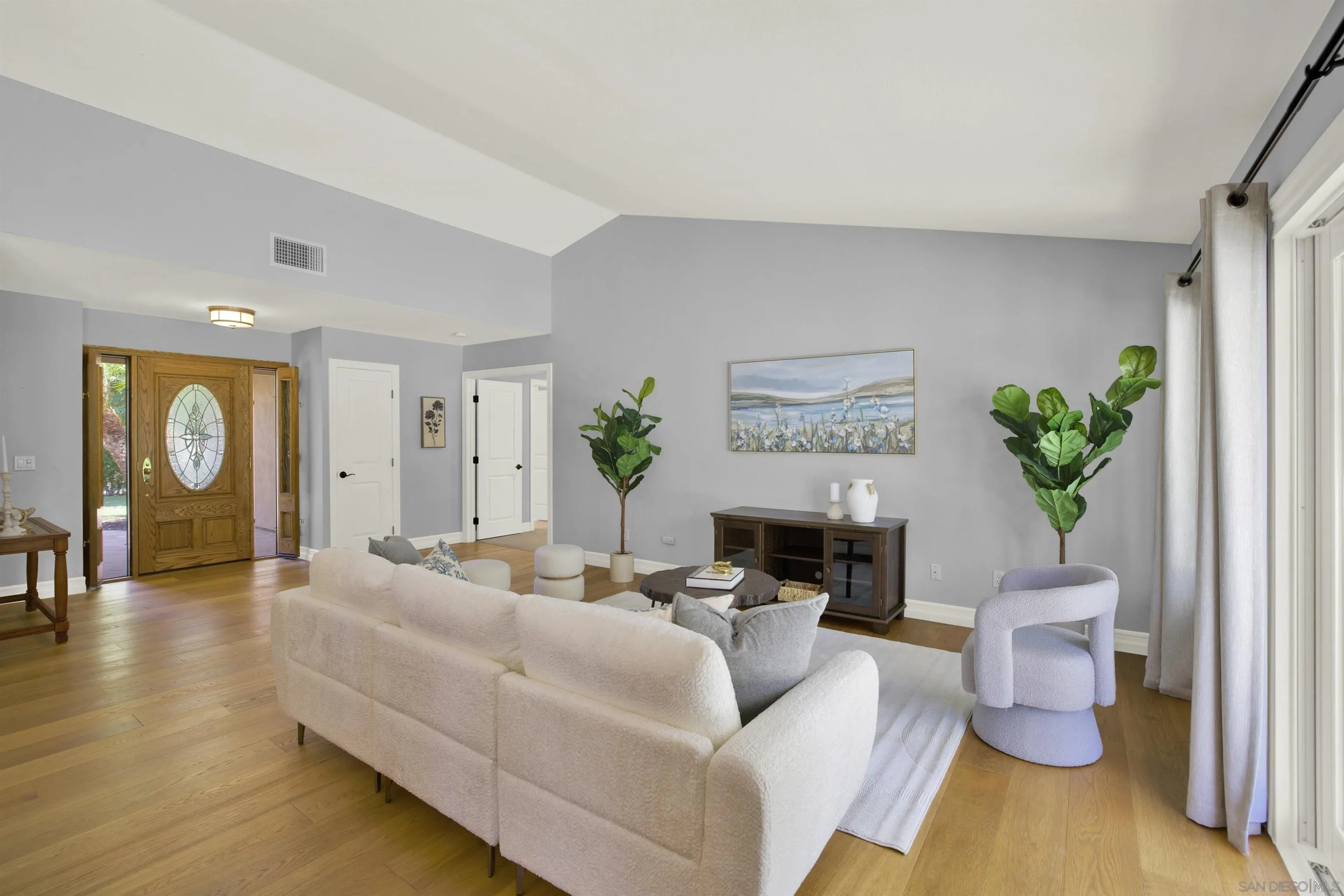 14012 Valley Springs Road Poway, CA 92064 - Photo 11 of 57 a living room with furniture and wooden floor
