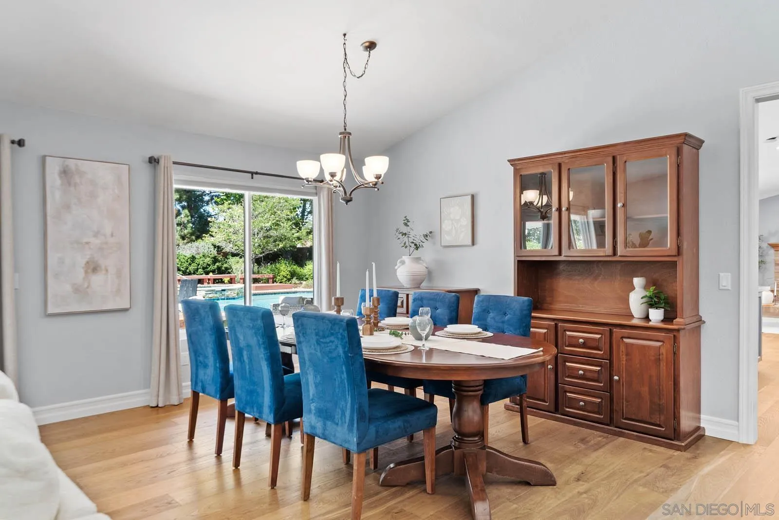 14012 Valley Springs Road Poway, CA 92064 - Photo 12 of 57 a view of a dining room with furniture window and wooden floor