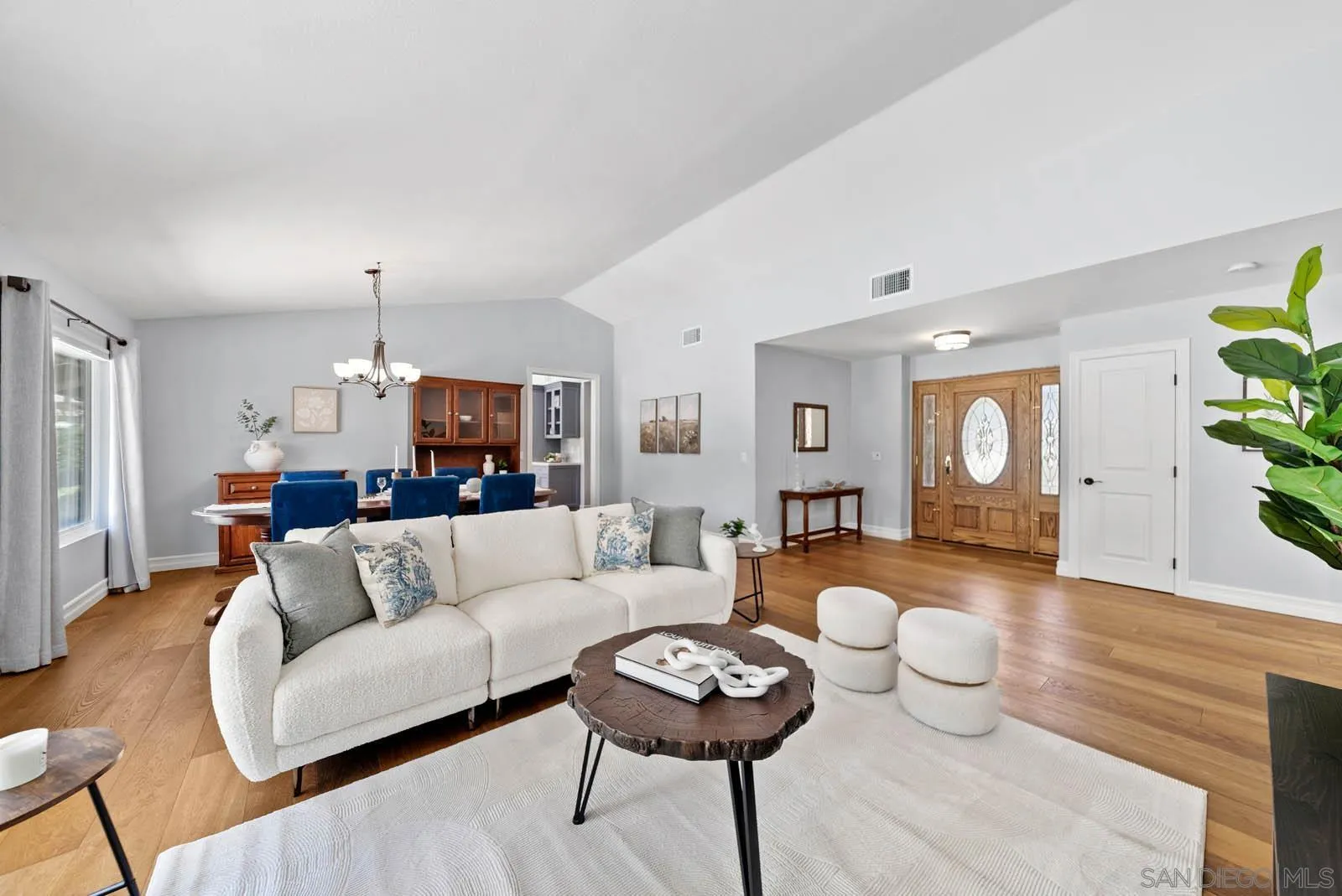 14012 Valley Springs Road Poway, CA 92064 - Photo 15 of 57 a living room with furniture and a wooden floor