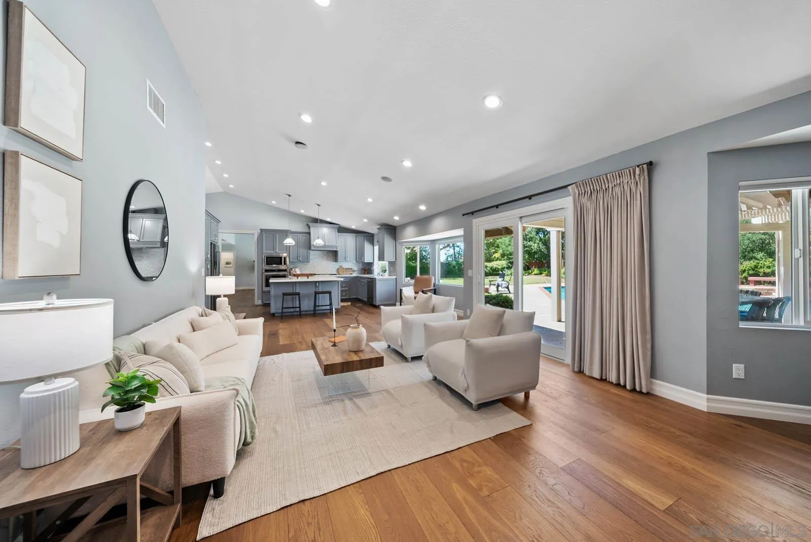 14012 Valley Springs Road Poway, CA 92064 - Photo 23 of 57 a living room with furniture and a large window