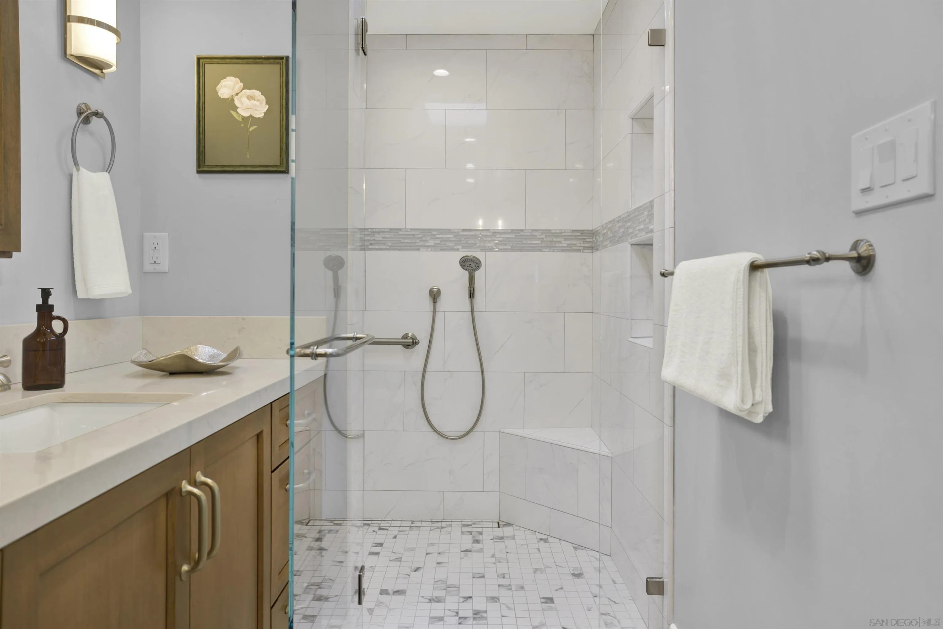14012 Valley Springs Road Poway, CA 92064 - Photo 29 of 57 a bathroom with a granite countertop shower sink and mirror