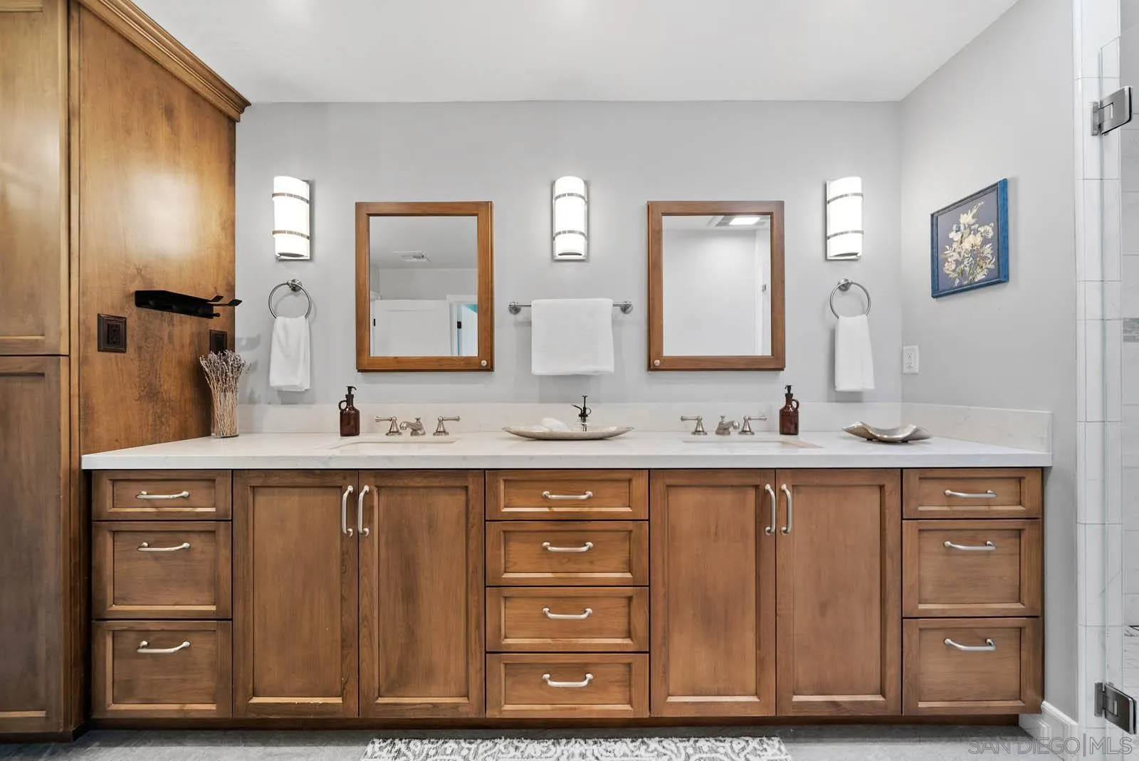 14012 Valley Springs Road Poway, CA 92064 - Photo 30 of 57 a bathroom with a granite countertop sink and a mirror