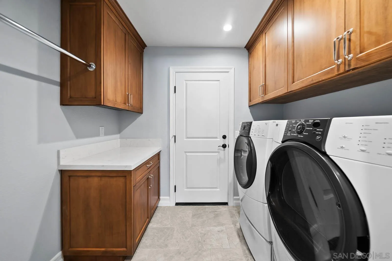 14012 Valley Springs Road Poway, CA 92064 - Photo 36 of 57 a utility room with dryer and washer