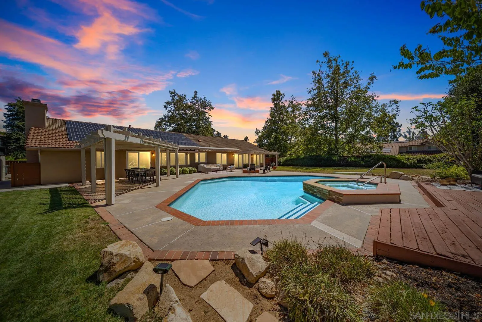 14012 Valley Springs Road Poway, CA 92064 - Photo 38 of 57 a view of a swimming pool with a patio