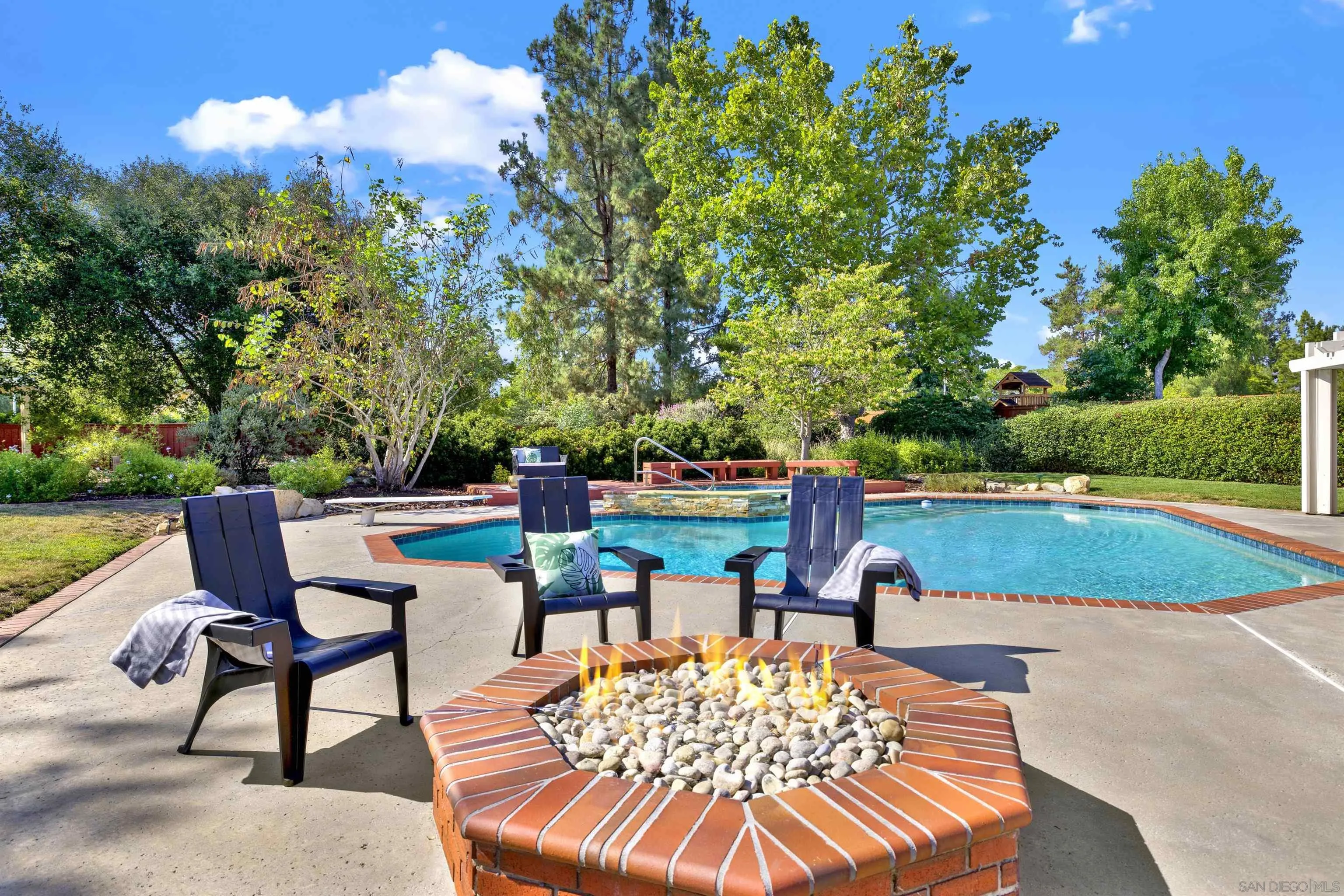 14012 Valley Springs Road Poway, CA 92064 - Photo 48 of 57 a view of a chairs and table in the patio