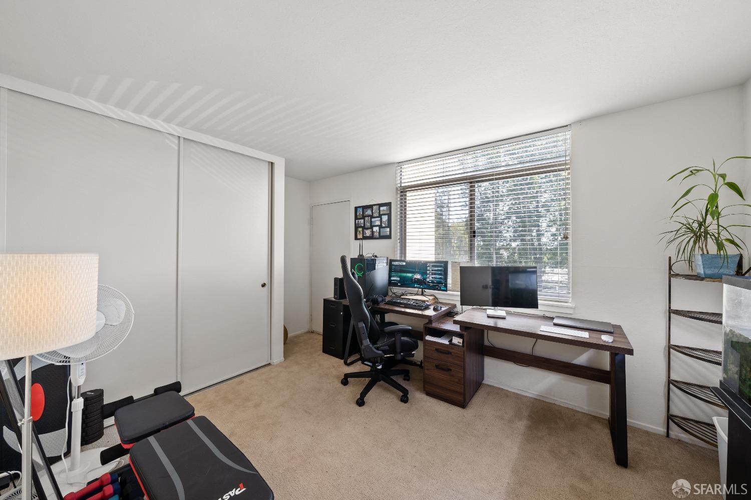 30 Quickstep Lane, Unit 3 San Francisco, CA 94115 - Photo 12 of 20 a view of a workspace with furniture and a window