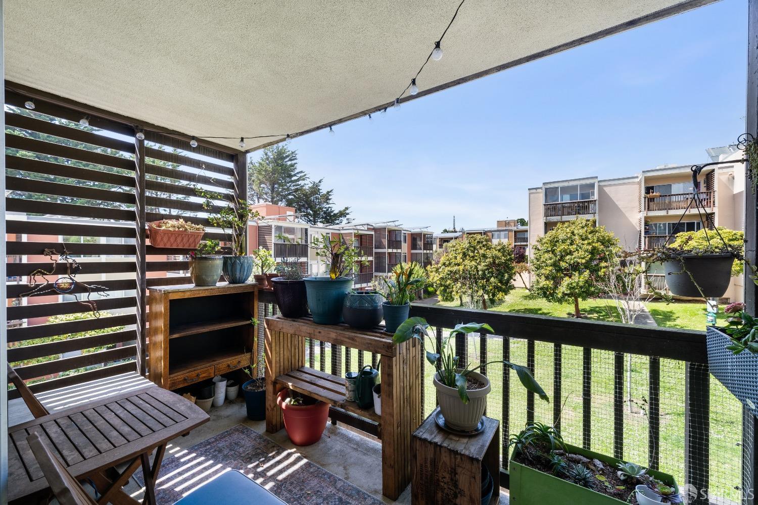 30 Quickstep Lane, Unit 3 San Francisco, CA 94115 - Photo 7 of 20 a view of a balcony with chairs and a potted plant