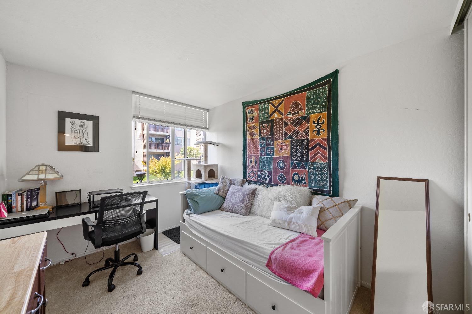 30 Quickstep Lane, Unit 3 San Francisco, CA 94115 - Photo 10 of 20 a living room with furniture and a large window