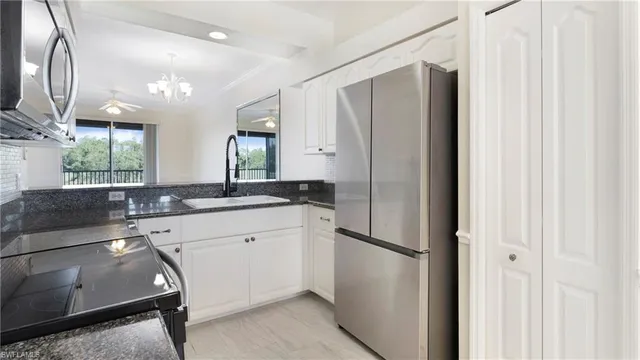 a bathroom with a double vanity sink and mirror