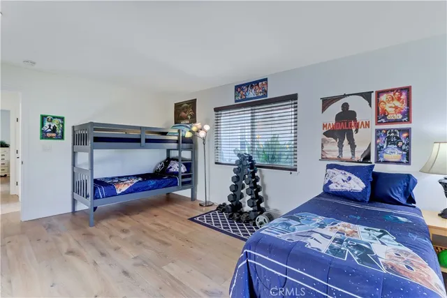 a bedroom with furniture and a bed