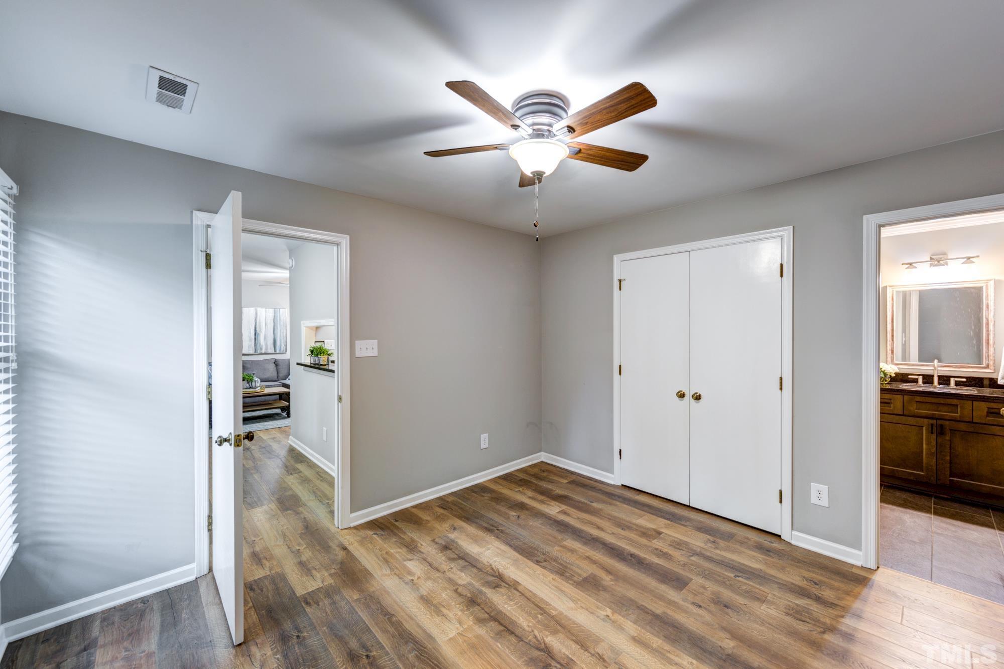 3623 Mill Run, Unit 3623 Raleigh, NC 27612 - Photo 14 of 23 a view of empty room with wooden floor