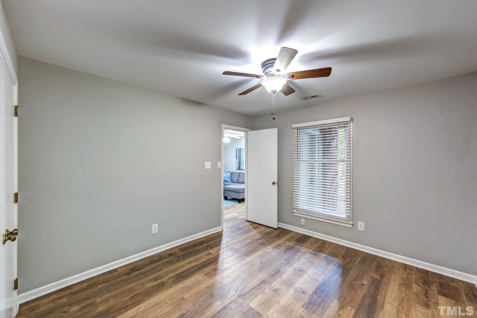 3623 Mill Run, Unit 3623 Raleigh, NC 27612 - Photo 15 of 23 a view of an empty room with a window