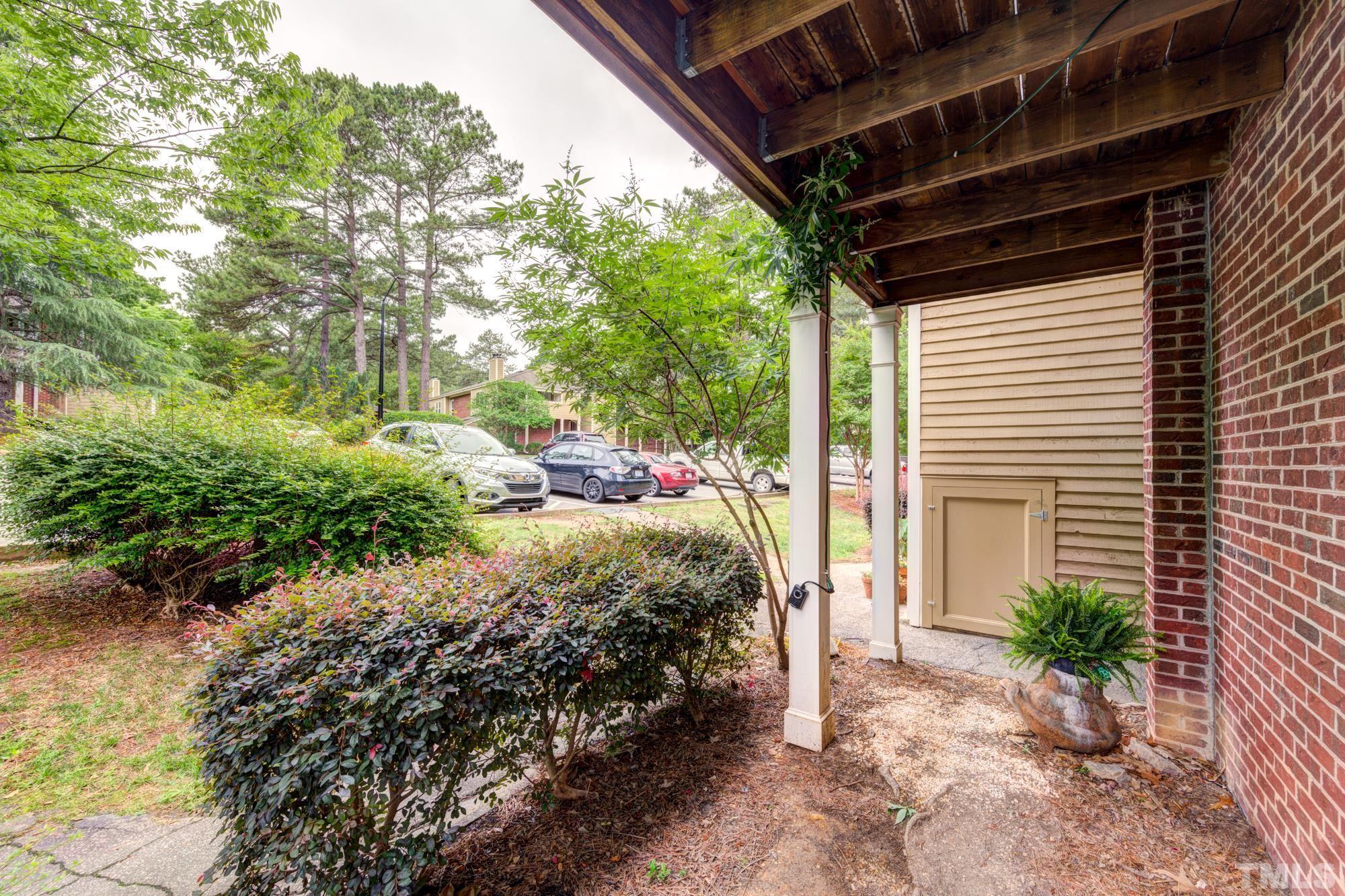 3623 Mill Run, Unit 3623 Raleigh, NC 27612 - Photo 22 of 23 a view of a backyard with pathway