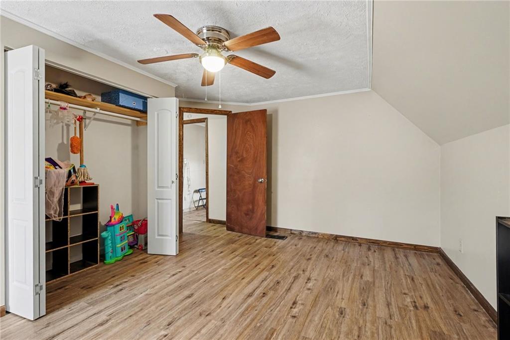 2986 Defore Road Toccoa, GA 30577 - Photo 15 of 19 wooden floor in an empty room