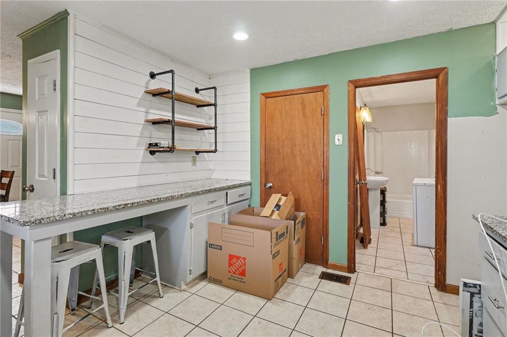 2986 Defore Road Toccoa, GA 30577 - Photo 5 of 19 a bathroom with a sink vanity and a mirror