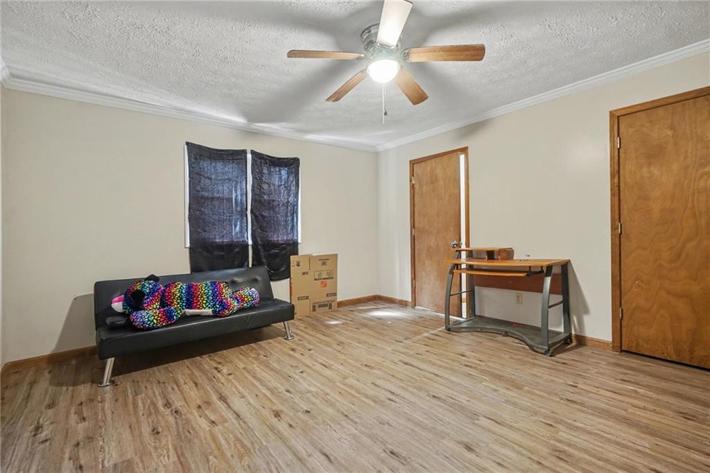 2986 Defore Road Toccoa, GA 30577 - Photo 9 of 19 a living room with furniture and a wooden floor