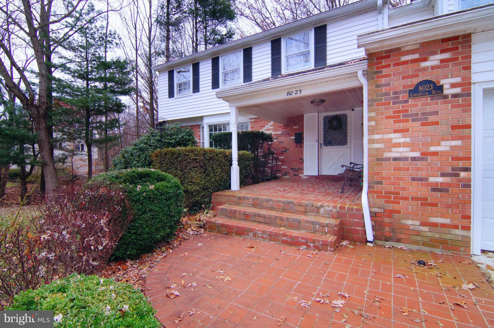 Brick walkway with covered Porch