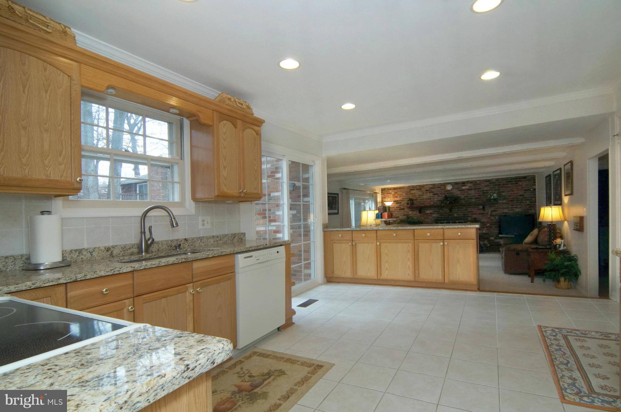 8023 Langbrook Road Springfield, VA 22152 - Photo 9 of 30 Kitchen overlooking Family Room