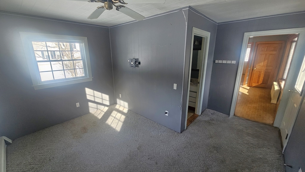 58 Ruggles Street Hardwick, MA 01031 - Photo 12 of 20 an empty room with windows and closet