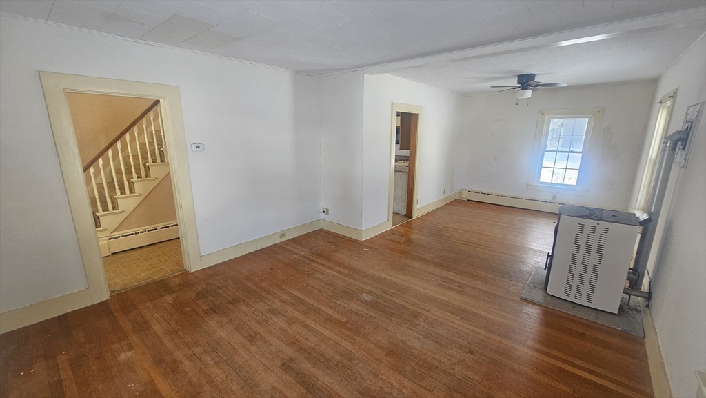 58 Ruggles Street Hardwick, MA 01031 - Photo 8 of 20 wooden floor in an empty room with a window