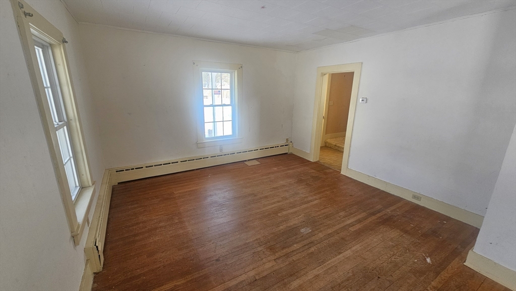 58 Ruggles Street Hardwick, MA 01031 - Photo 10 of 20 a view of a room with wooden floor and window