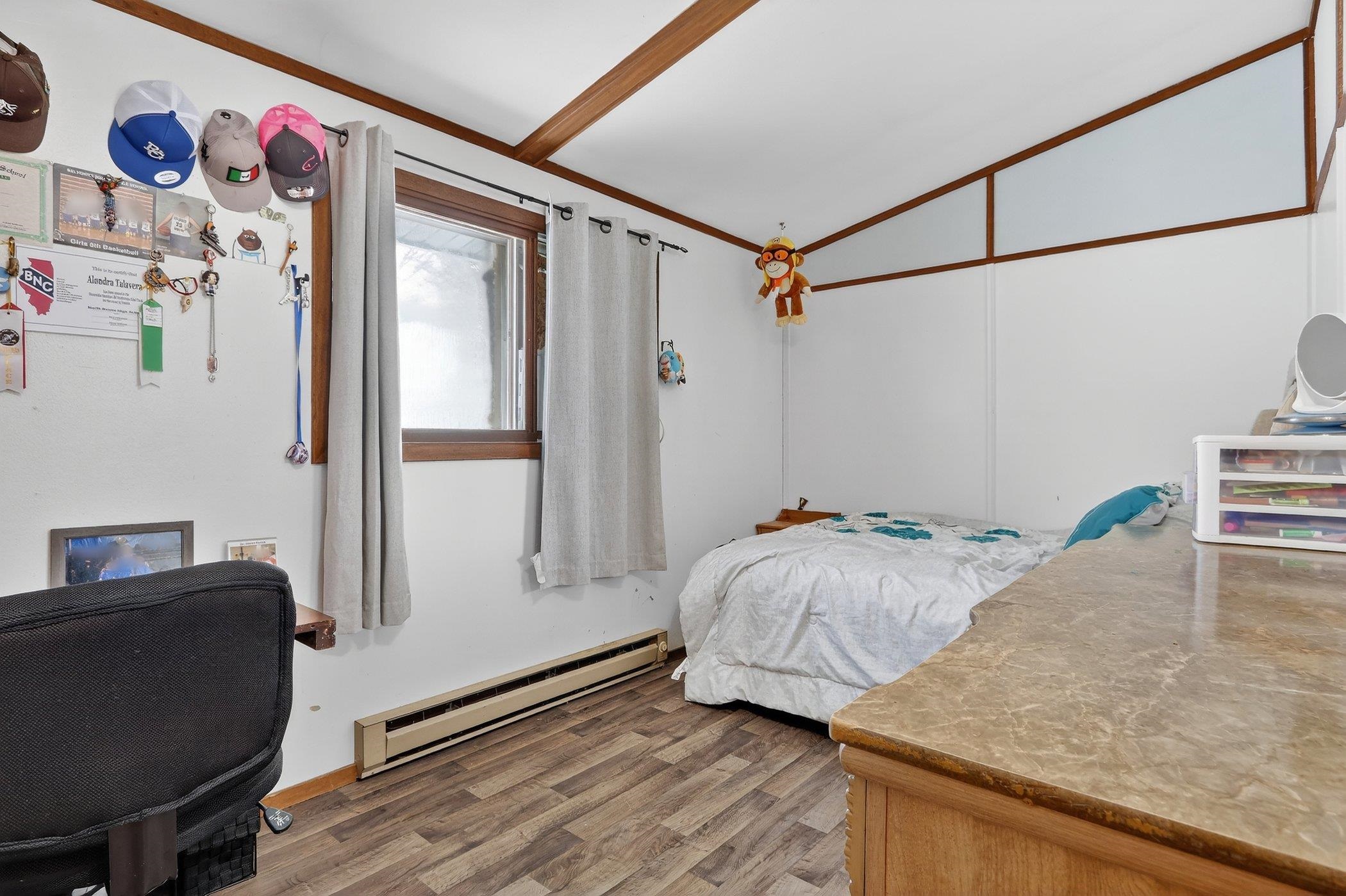 14858 Beaverton Road Poplar Grove, IL 61065 - Photo 22 of 45 a bedroom with a bed and furniture