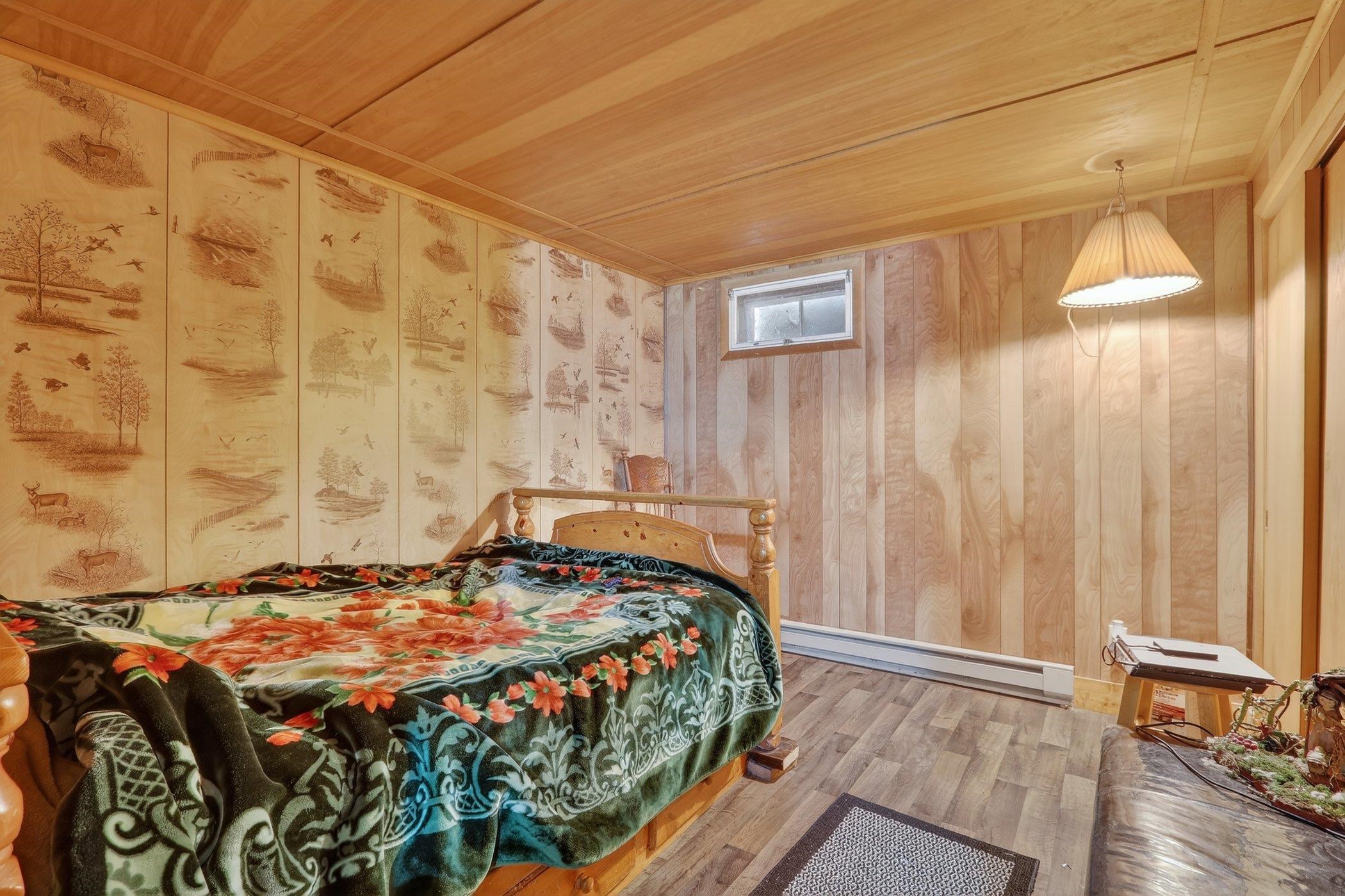 14858 Beaverton Road Poplar Grove, IL 61065 - Photo 31 of 45 a bedroom with a bed and a window