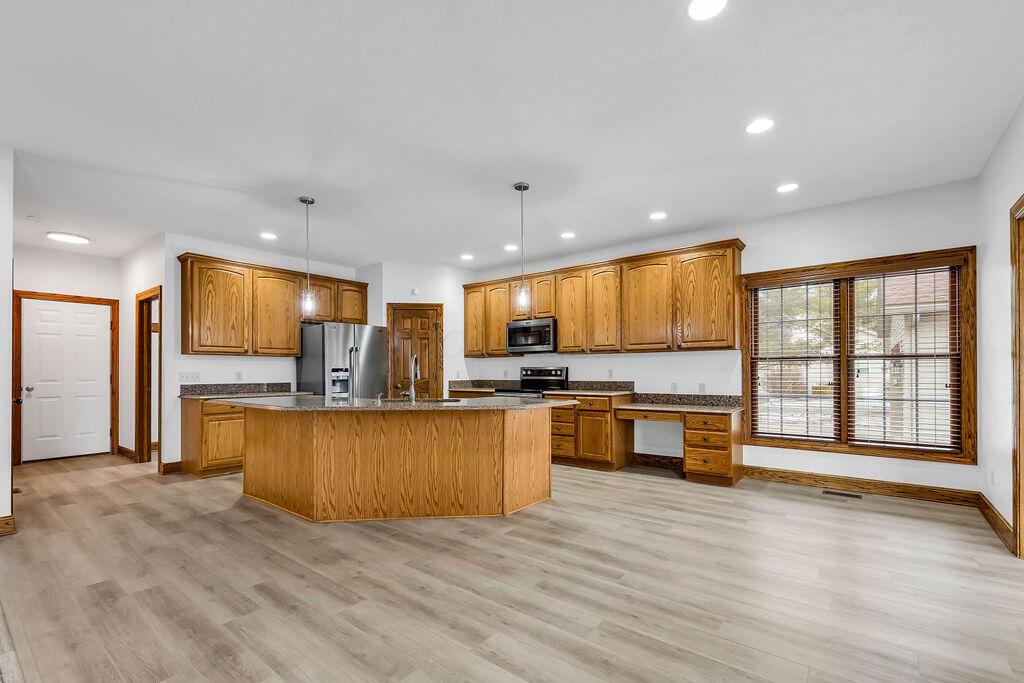 330 Longshore Road Sunbury, OH 43074 - Photo 10 of 73 42" Hardwood cabinets, pantry, desk, large, sitting, Island with sink and all new Maytag appliances