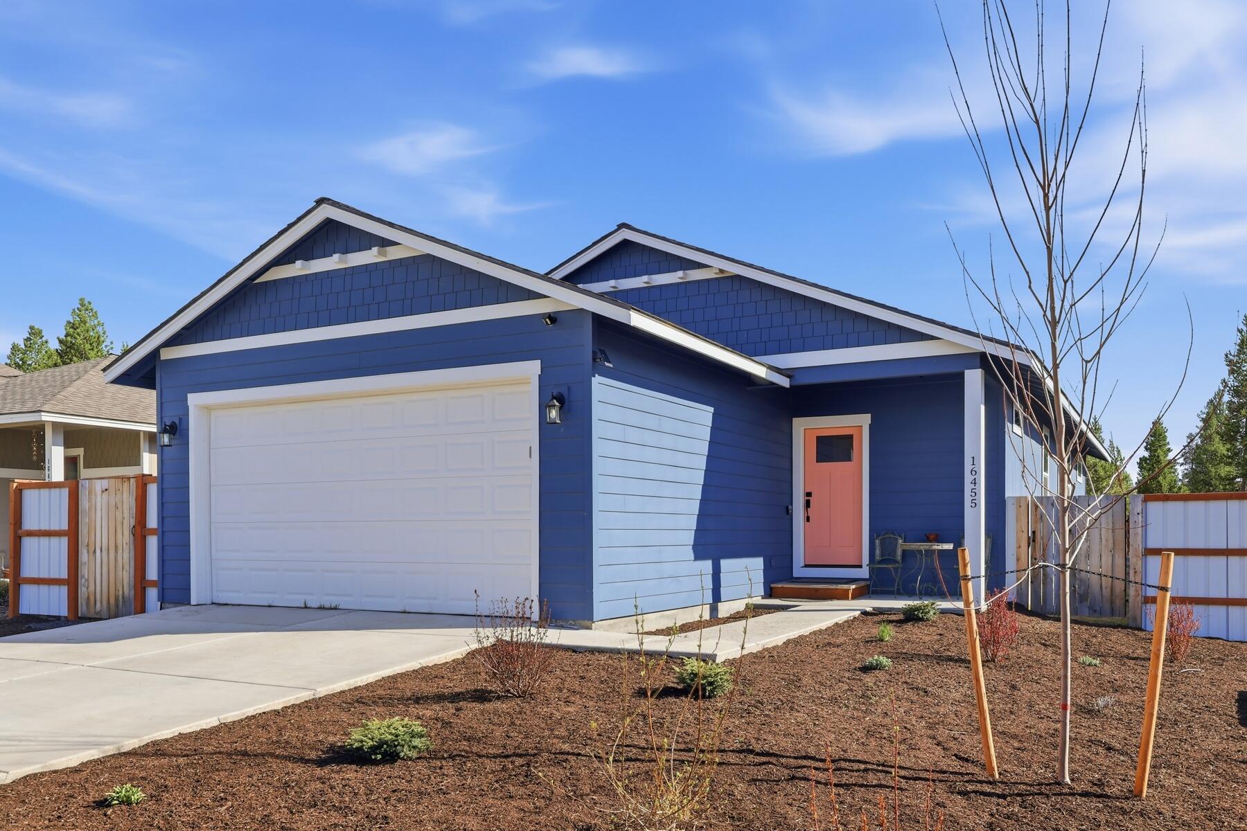 16455 Bassett Road La Pine, OR 97739 - Photo 43 of 44 a front view of a house with a yard and garage