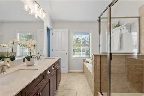 a bathroom with a bathtub and a sink