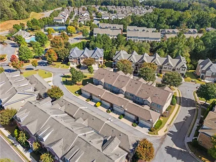 a view of a door of the house and tree