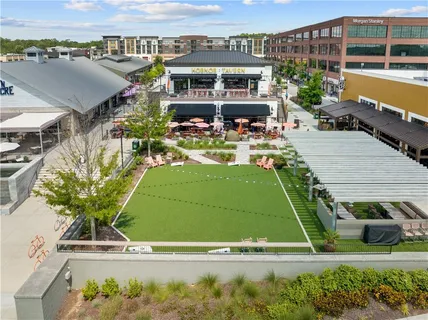 an aerial view of a house with a garden