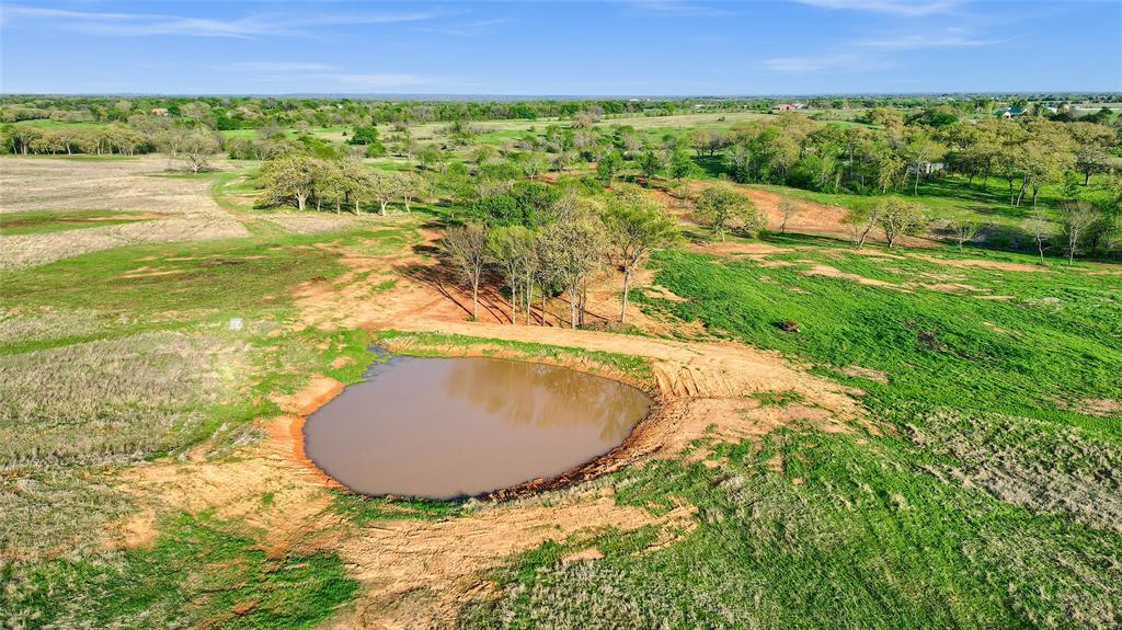 Lot 4 Rock Creek Road Gordonville, TX 76245 - Photo 5 of 30 a view of a swimming pool and a yard