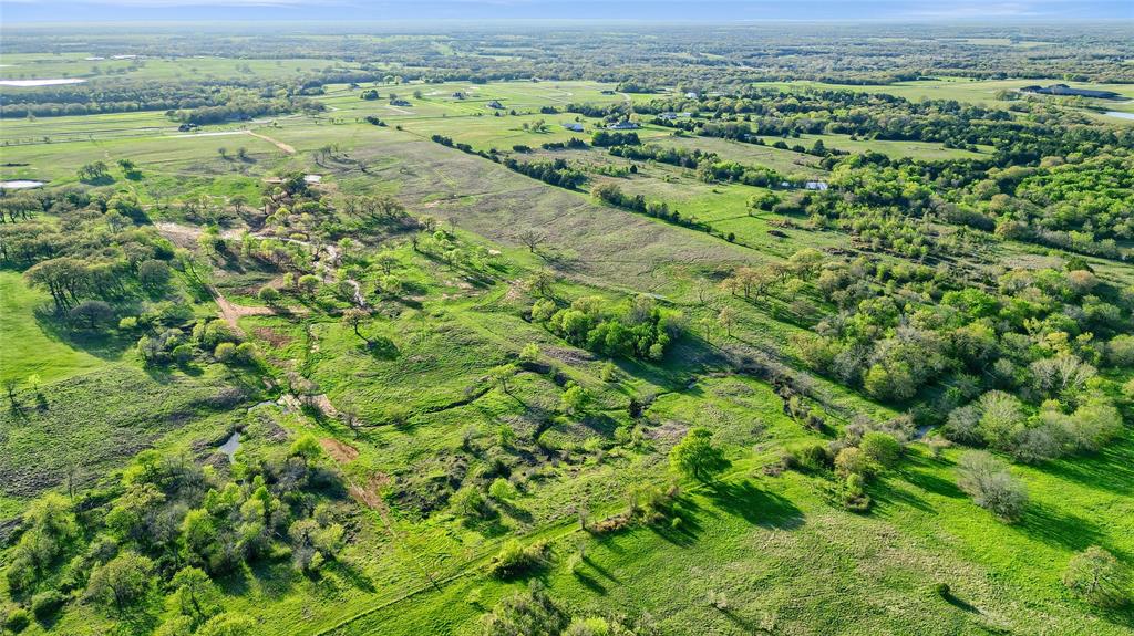 Lot 4 Rock Creek Road Gordonville, TX 76245 - Photo 7 of 30 a view of a yard with an outdoor space